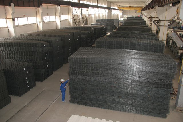 A pile of steel matting products